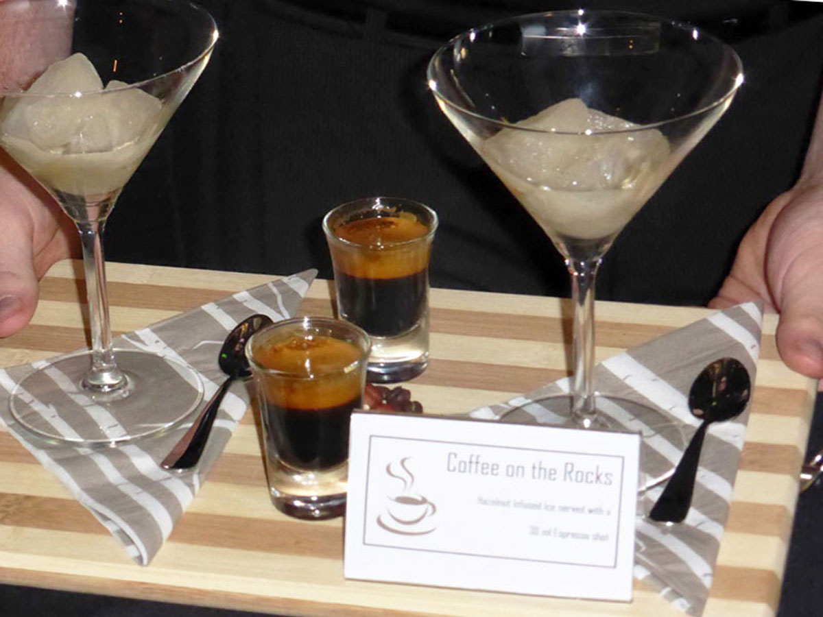 2013 Become a Barista competition - signature beverages served in martini glasses and shot glasses with sign saying 'Coffee on the Rocks'