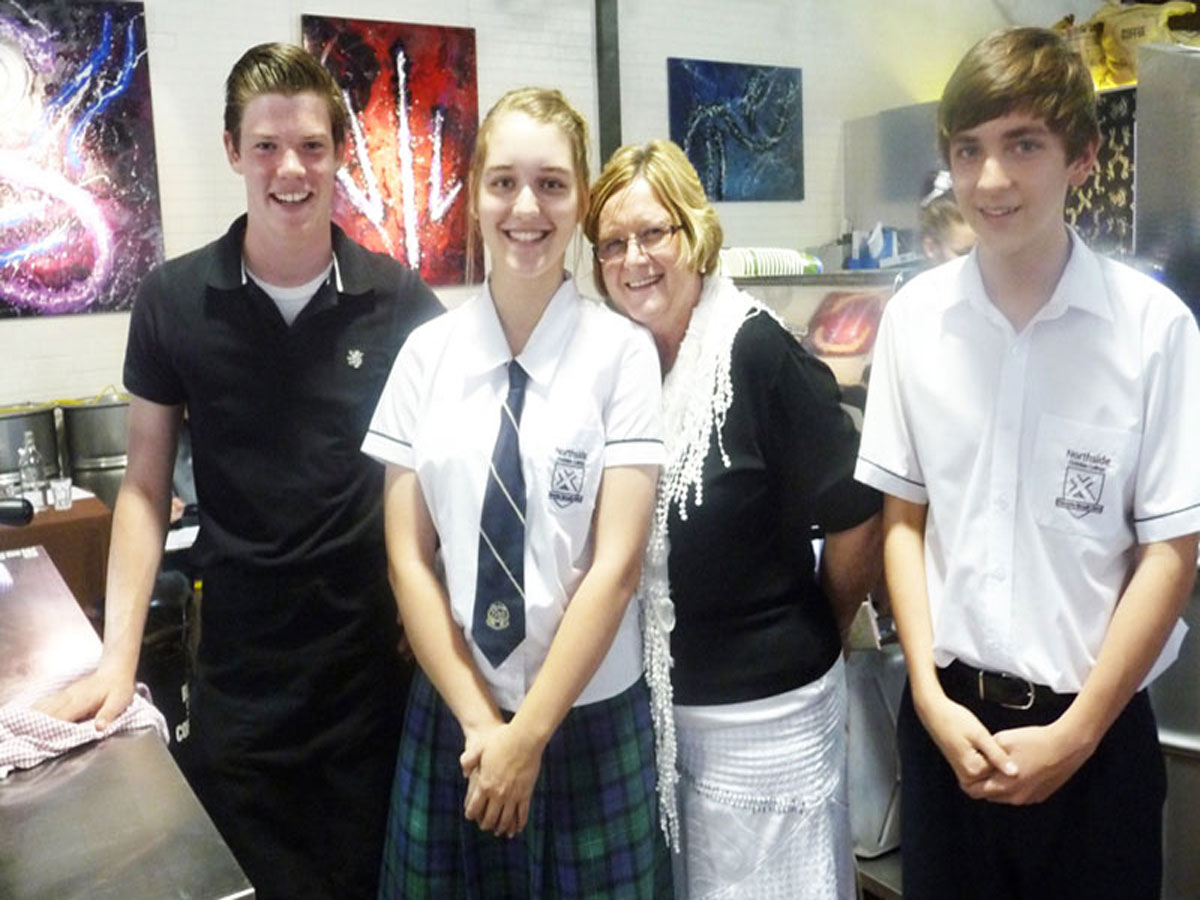 Three student competitors with their teacher at the 2012 Become A Barista competition staged at Wolff Coffee Roasters