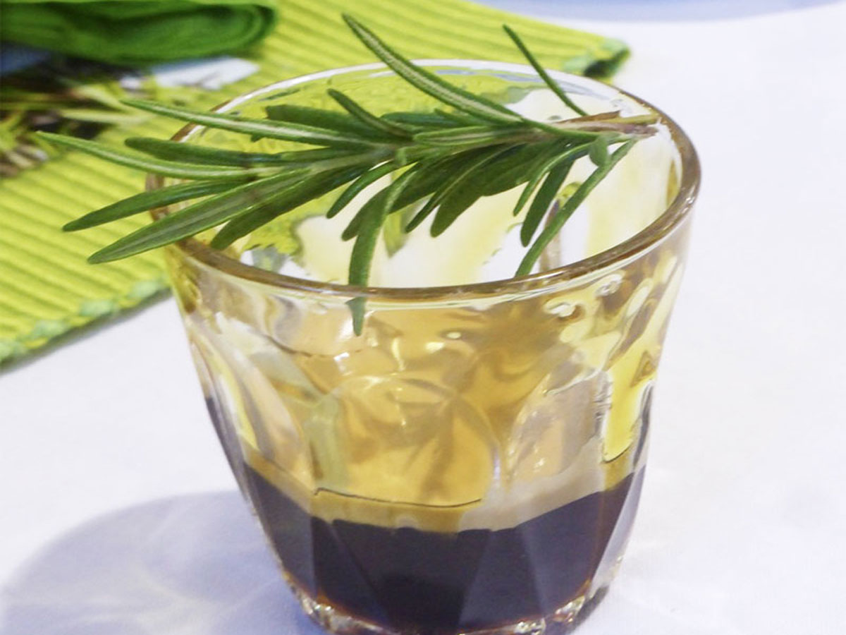 Signature beverage in a short glass with a rosemary sprig on top at the 2016 Become A Barista competition at Extraction Artisan Coffee, Slacks Creek