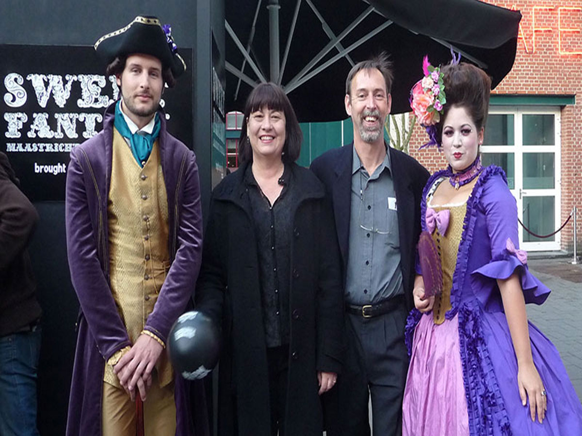 Christine Cottrell and Paul Holiday with characters dressed in period costume at Sweet Fantasy barista party at World of Coffee 2011 in Maastrict, The Netherlands